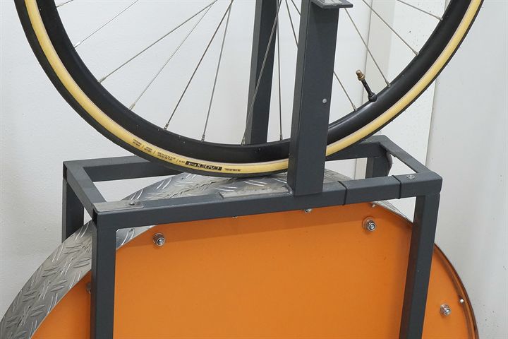 Cadex Aero Cotton 28 road bike tire on a rolling resistance test machine