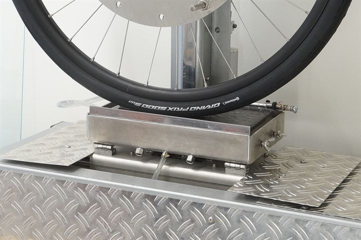 Continental Grand Prix 5000 S TR road bike tire on a grip test machine