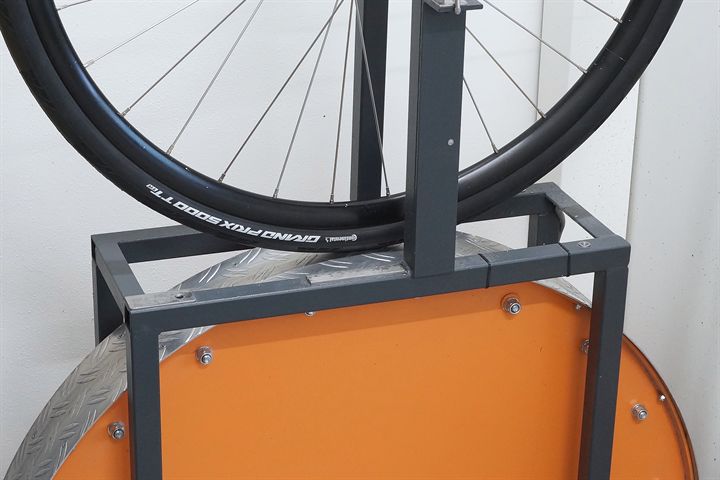 Continental Grand Prix 5000 TT TR 30 road bike tire on a rolling resistance test machine