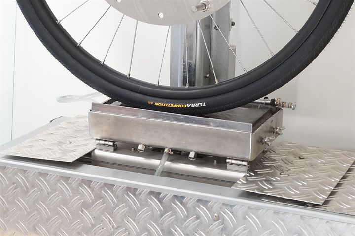 Continental Terra Competition Race Rapid road bike tire on a grip test machine