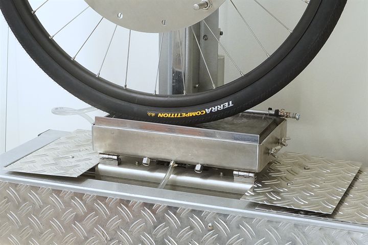 Continental Terra Competition Race Rapid road bike tire on a grip test machine