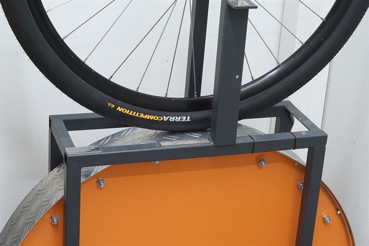 Continental Terra Competition Race Rapid 45 road bike tire on a rolling resistance test machine