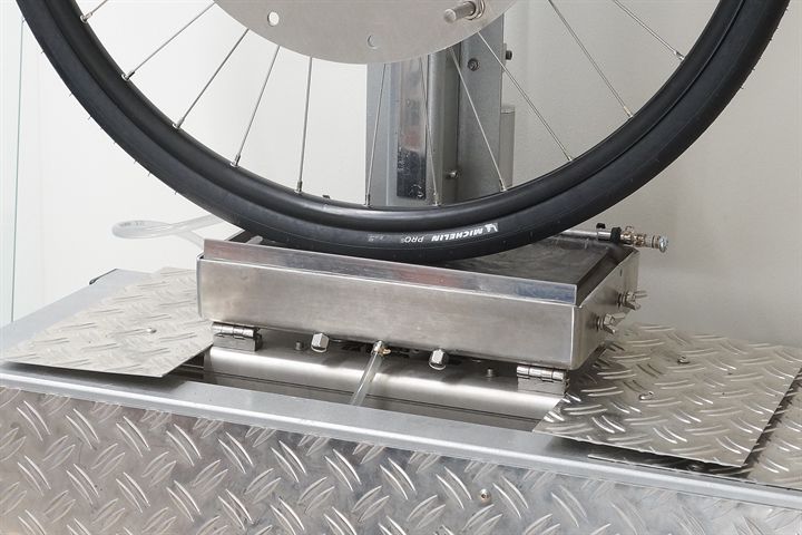 Michelin Pro 5 TLR road bike tire on a grip test machine