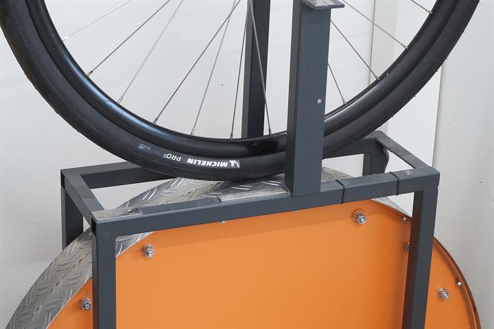 Michelin Pro 5 TLR 40 road bike tire on a rolling resistance test machine
