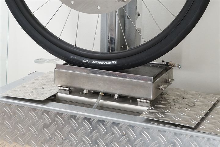 Michelin Pro 5 TLR road bike tire on a grip test machine