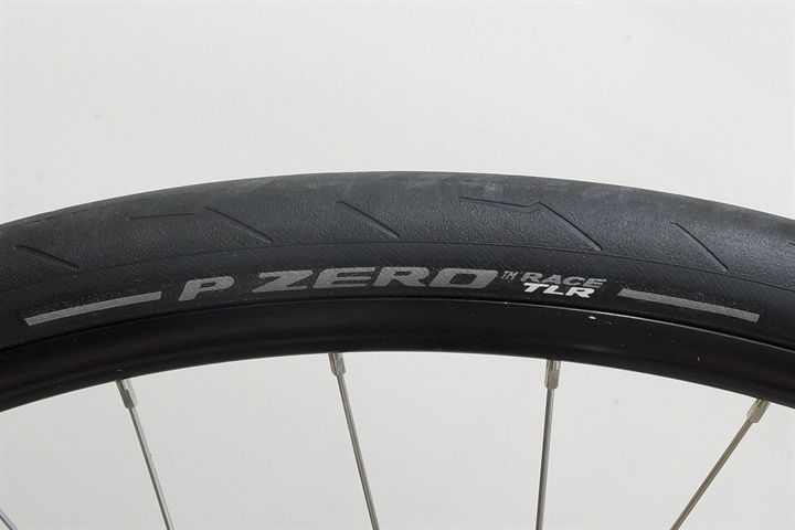 Pirelli P Zero Race TLR SpeedCore 30 road bike tire on a rolling resistance test machine