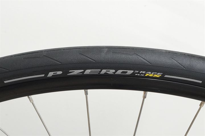 Pirelli P Zero Race TLR RS SpeedCore 30 road bike tire on a rolling resistance test machine