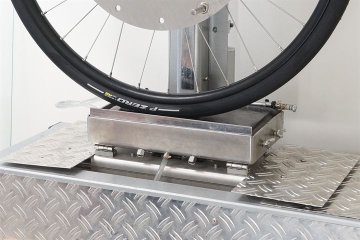 Pirelli P Zero Race TLR RS SpeedCore road bike tire on a grip test machine