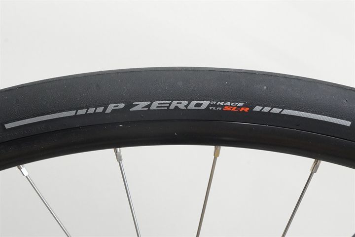 Pirelli P Zero Race TLR SL-R 28 road bike tire on a rolling resistance test machine