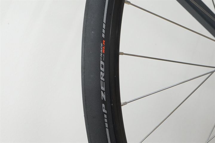 Pirelli P Zero Race TLR SL-R 28 road bike tire on a rolling resistance test machine