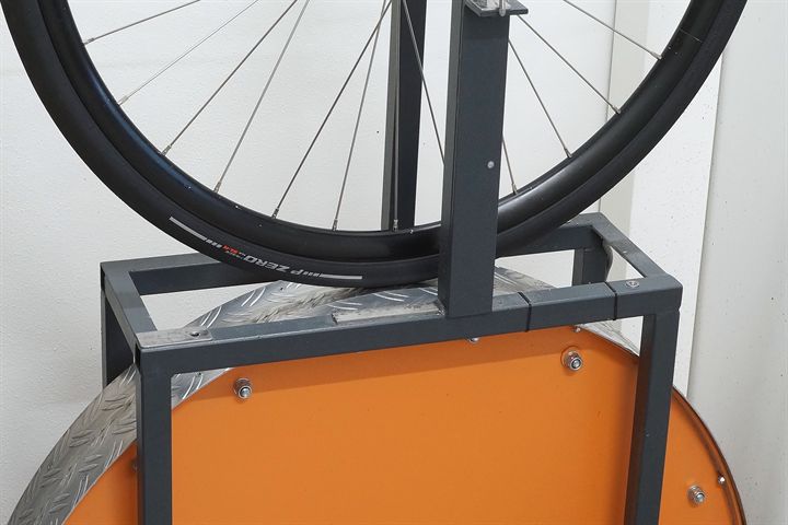 Pirelli P Zero Race TLR SL-R 30 road bike tire on a rolling resistance test machine