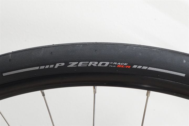 Pirelli P Zero Race TLR SL-R 30 road bike tire on a rolling resistance test machine