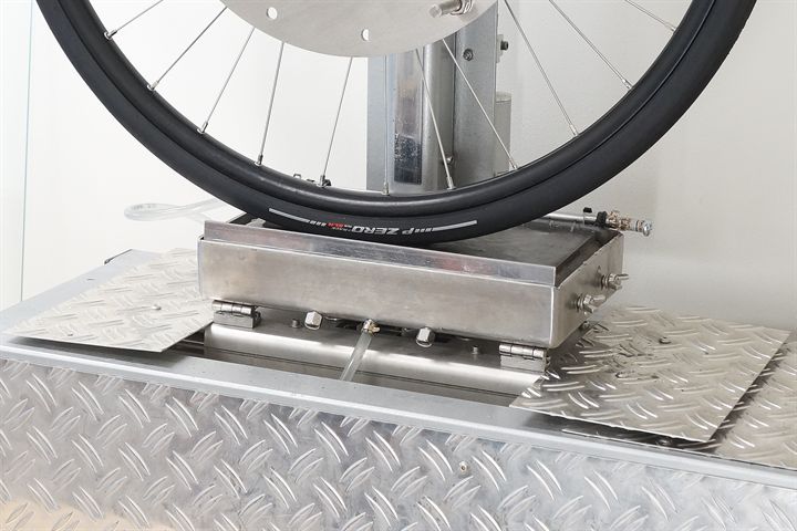 Pirelli P Zero Race TLR SL-R road bike tire on a grip test machine