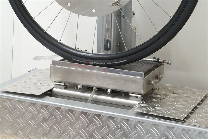 Pirelli P Zero Race TLR SL-R road bike tire on a grip test machine
