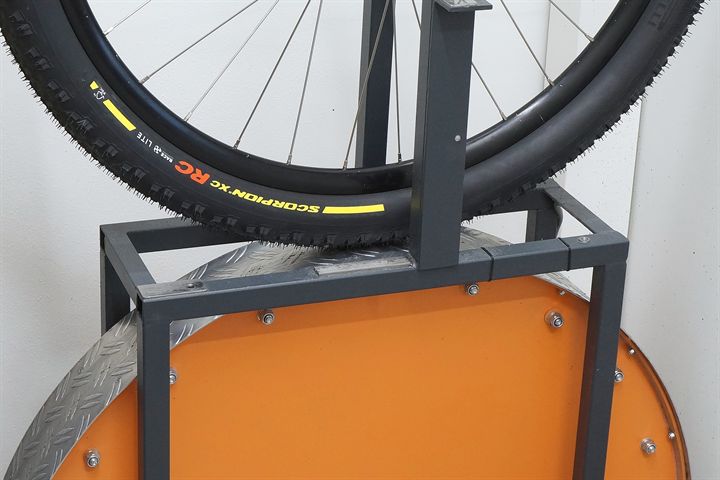 Pirelli Scorpion XC RC Race Lite Team Edition road bike tire on a rolling resistance test machine