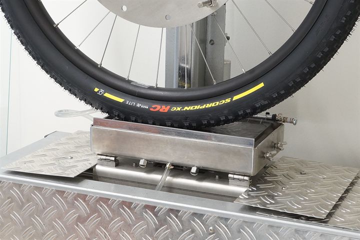 Pirelli Scorpion XC RC Race Lite Team Edition road bike tire on a grip test machine