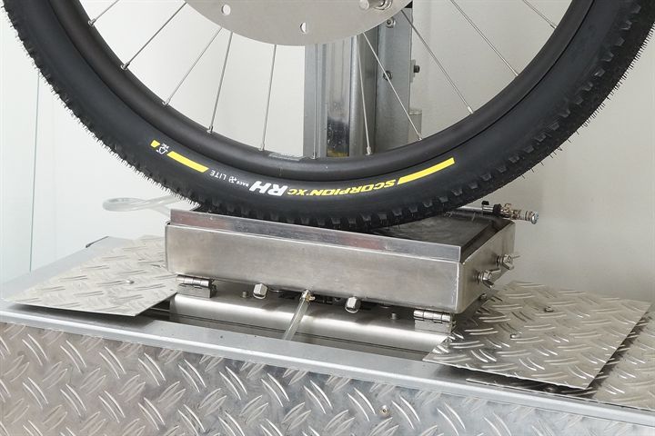 Pirelli Scorpion XC RH Lite Team Edition road bike tire on a grip test machine