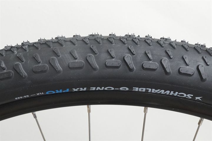 Schwalbe G-One RX Pro (black) 55  mountain bike tire on a rolling resistance test machine