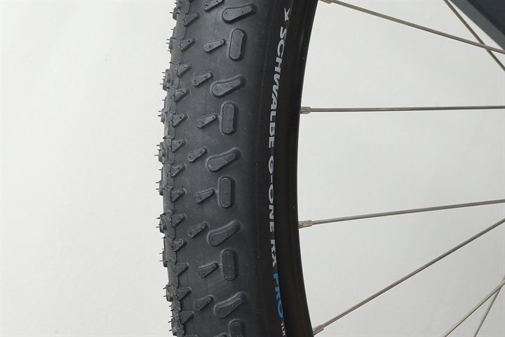 Schwalbe G-One RX Pro (black) 55  mountain bike tire on a rolling resistance test machine