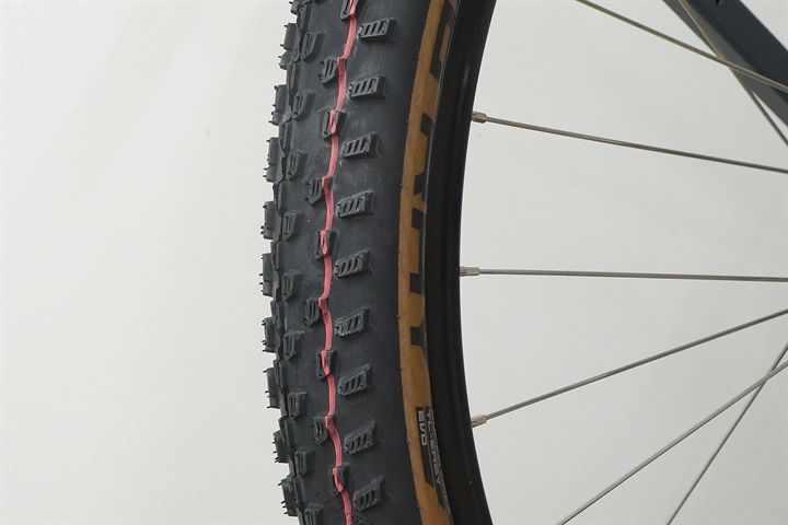 Schwalbe Racing Ray Super Race  mountain bike tire on a rolling resistance test machine