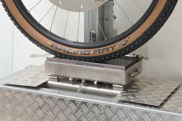 Schwalbe Racing Ray Super Race road bike tire on a grip test machine