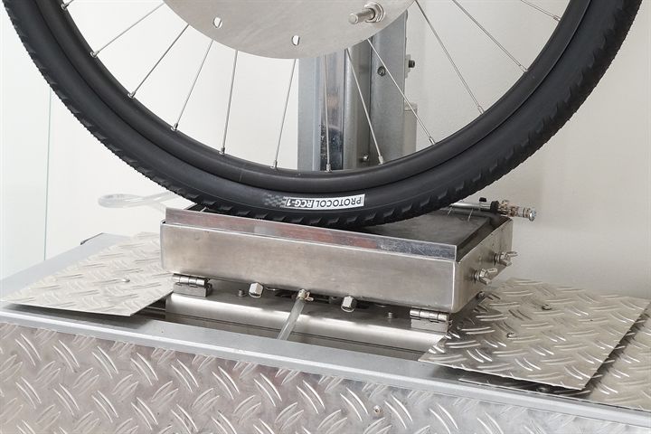 Silca Protocol RCG-1 road bike tire on a grip test machine