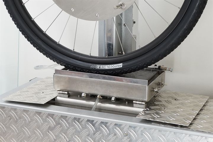 Silca Protocol RCG-3 road bike tire on a grip test machine