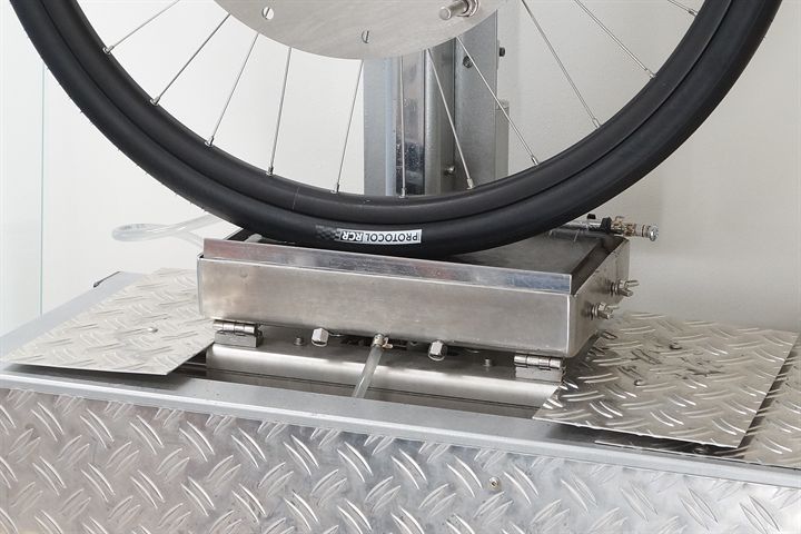 Silca Protocol RCR road bike tire on a grip test machine