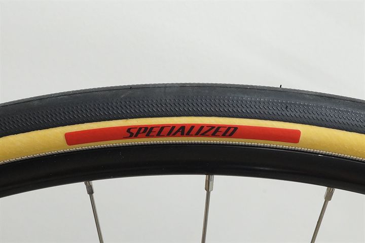 Specialized Cotton TLR 28 road bike tire on a rolling resistance test machine