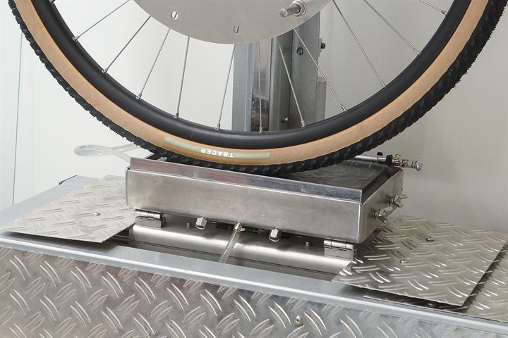 Specialized Tracer TLR road bike tire on a grip test machine
