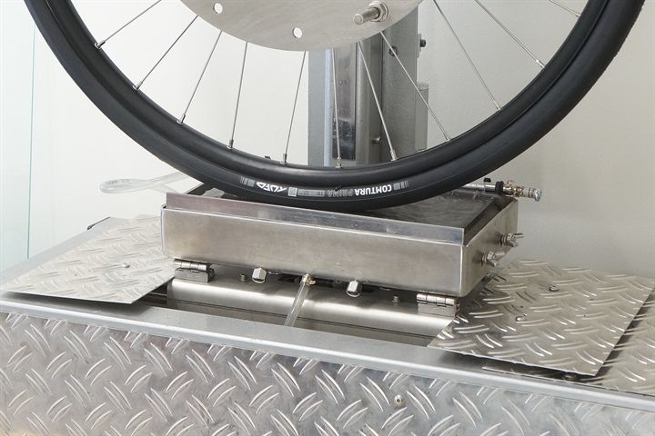 Tufo Comtura Prima road bike tire on a grip test machine