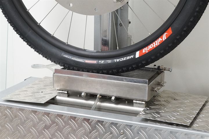 Vittoria Mezcal XC Trail road bike tire on a grip test machine