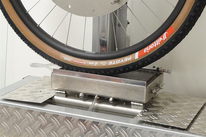 Vittoria Peyote XC Race road bike tire on a grip test machine