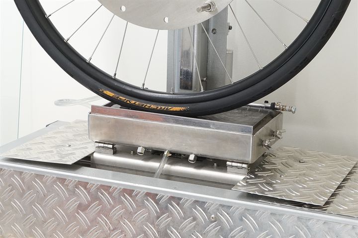 Continental Archetype Continental Archetype road bike tire on a grip test machine