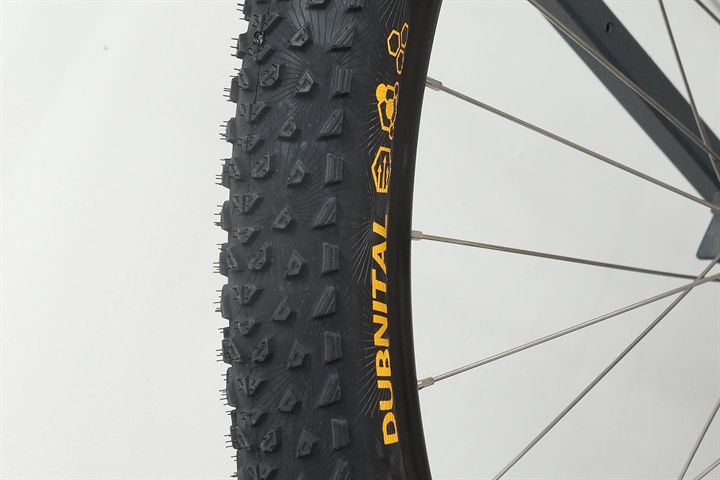 Continental Dubnital Race Grip  mountain bike tire on a rolling resistance test machine