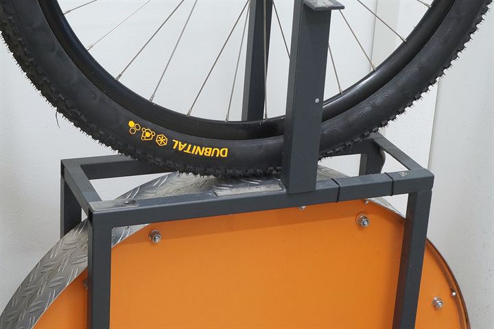 Continental Dubnital Trail Rapid road bike tire on a rolling resistance test machine