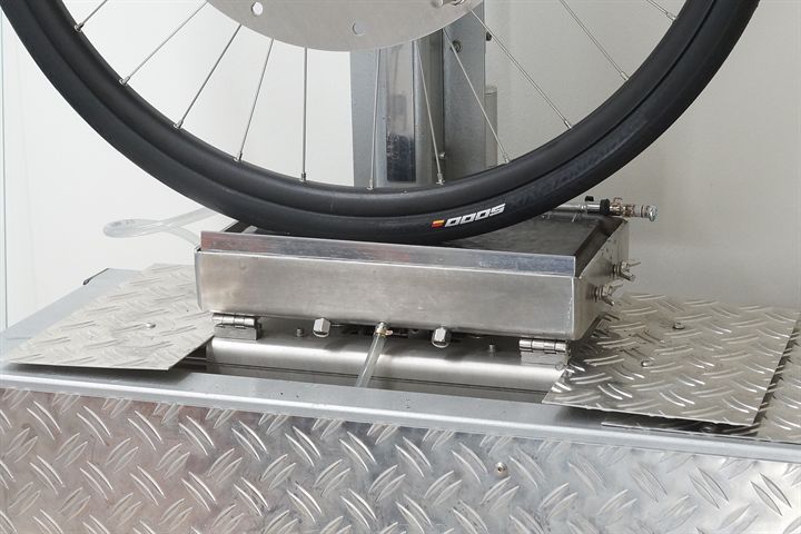 Continental Grand Prix 5000 road bike tire on a grip test machine