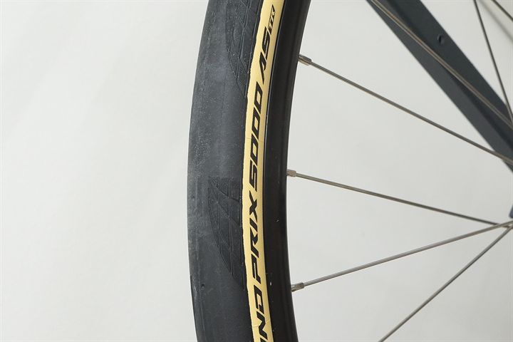 Continental Grand Prix 5000 All Season TR (cream) 35  mountain bike tire on a rolling resistance test machine