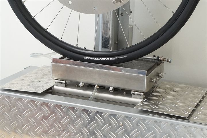 Continental Grand Prix TR Continental Grand Prix TR road bike tire on a grip test machine