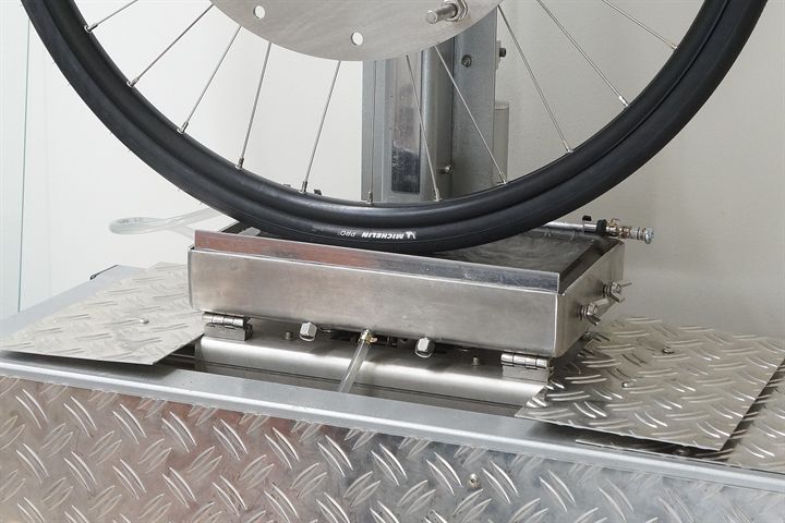 Michelin Pro 5 TLR road bike tire on a grip test machine
