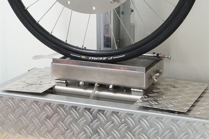 Pirelli P Zero Race RS Pirelli P Zero Race RS road bike tire on a grip test machine