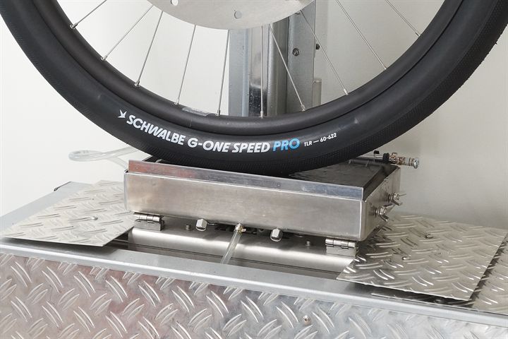 Schwalbe G-One Speed Pro Schwalbe G-One Speed Pro road bike tire on a grip test machine