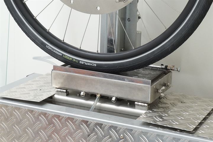 Schwalbe Green Marathon road bike tire on a grip test machine