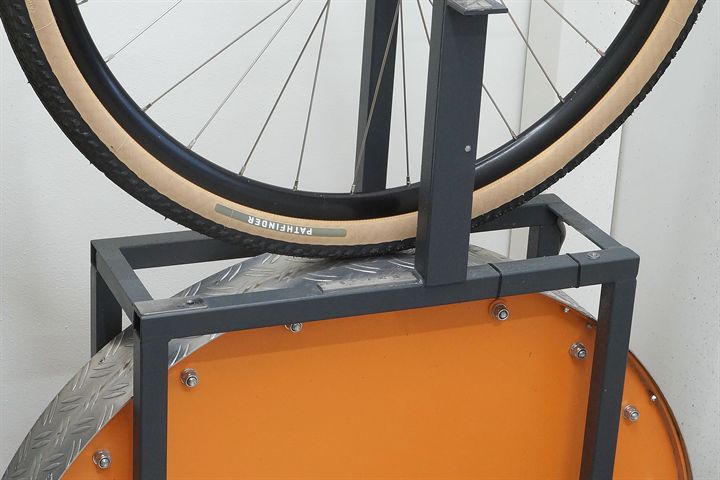 Specialized Pathfinder TLR 45 Specialized Pathfinder TLR 45 road bike tire on a rolling resistance test machine