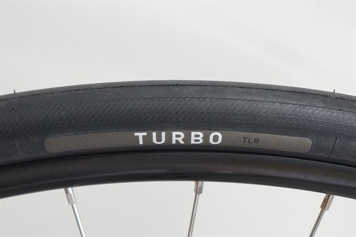 Specialized S-Works Turbo TLR 28 Specialized S-Works Turbo TLR 28 road bike tire on a rolling resistance test machine