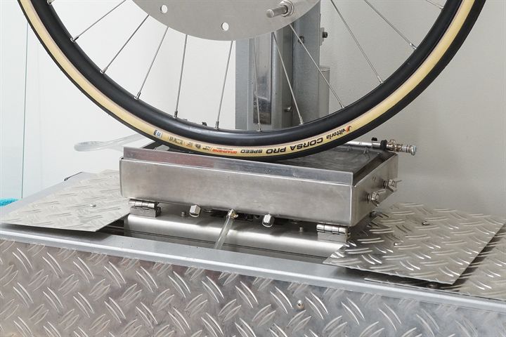 Vittoria Corsa Pro Speed TLR WR road bike tire on a grip test machine