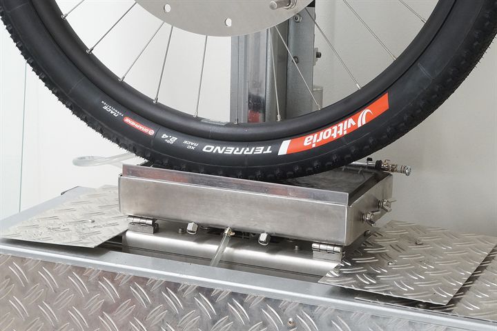 Vittoria Terreno XC Race road bike tire on a grip test machine