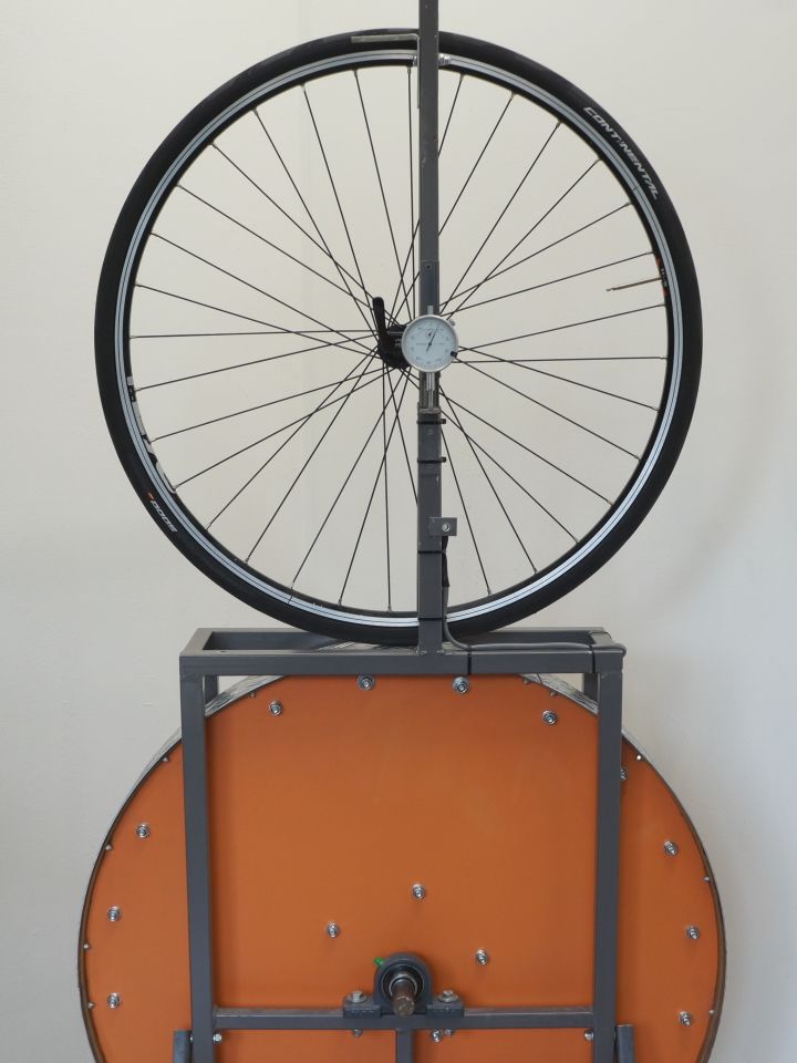 rolling resistance test machine with a road bike tire mounted